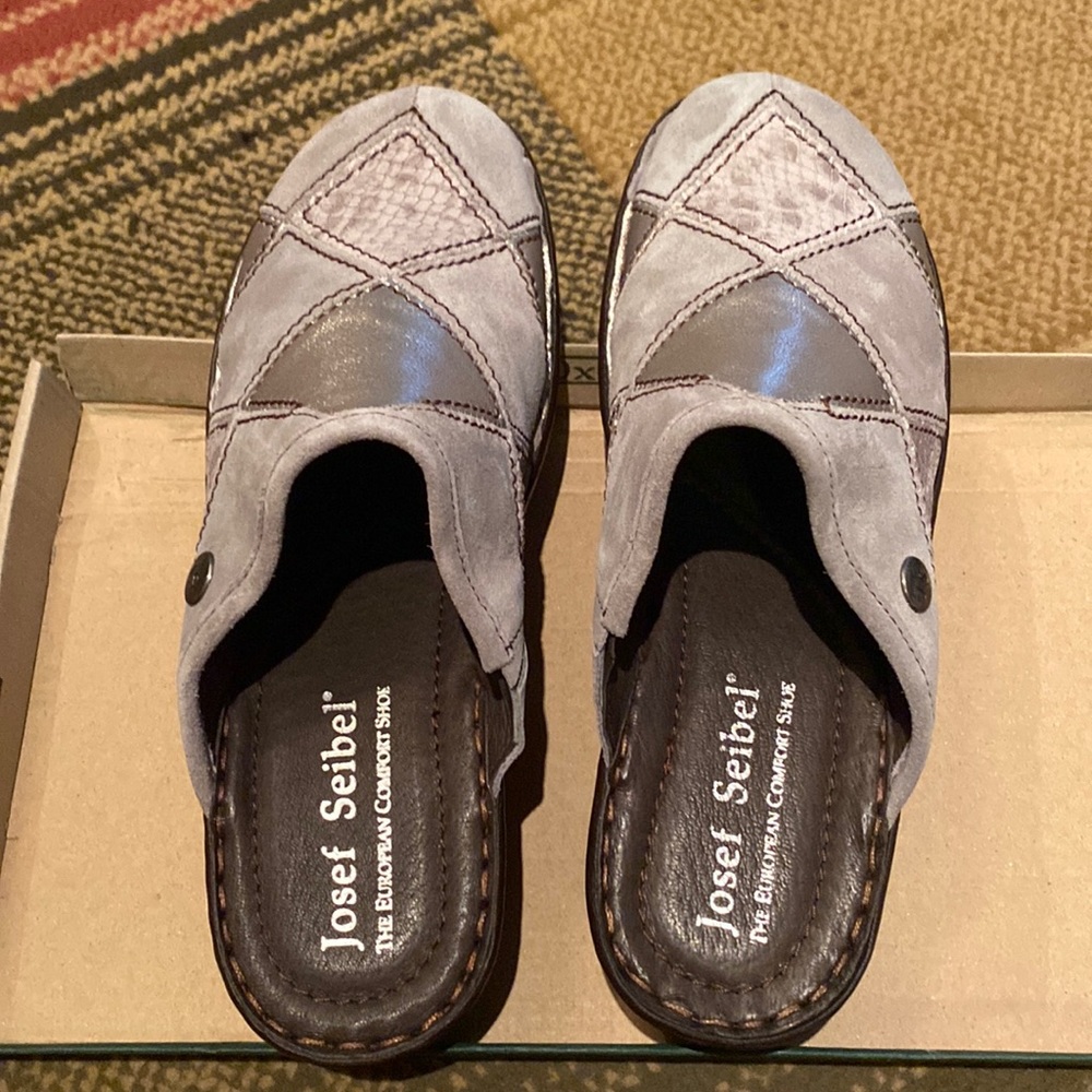 Gray with patterns of silver and snake print clogs